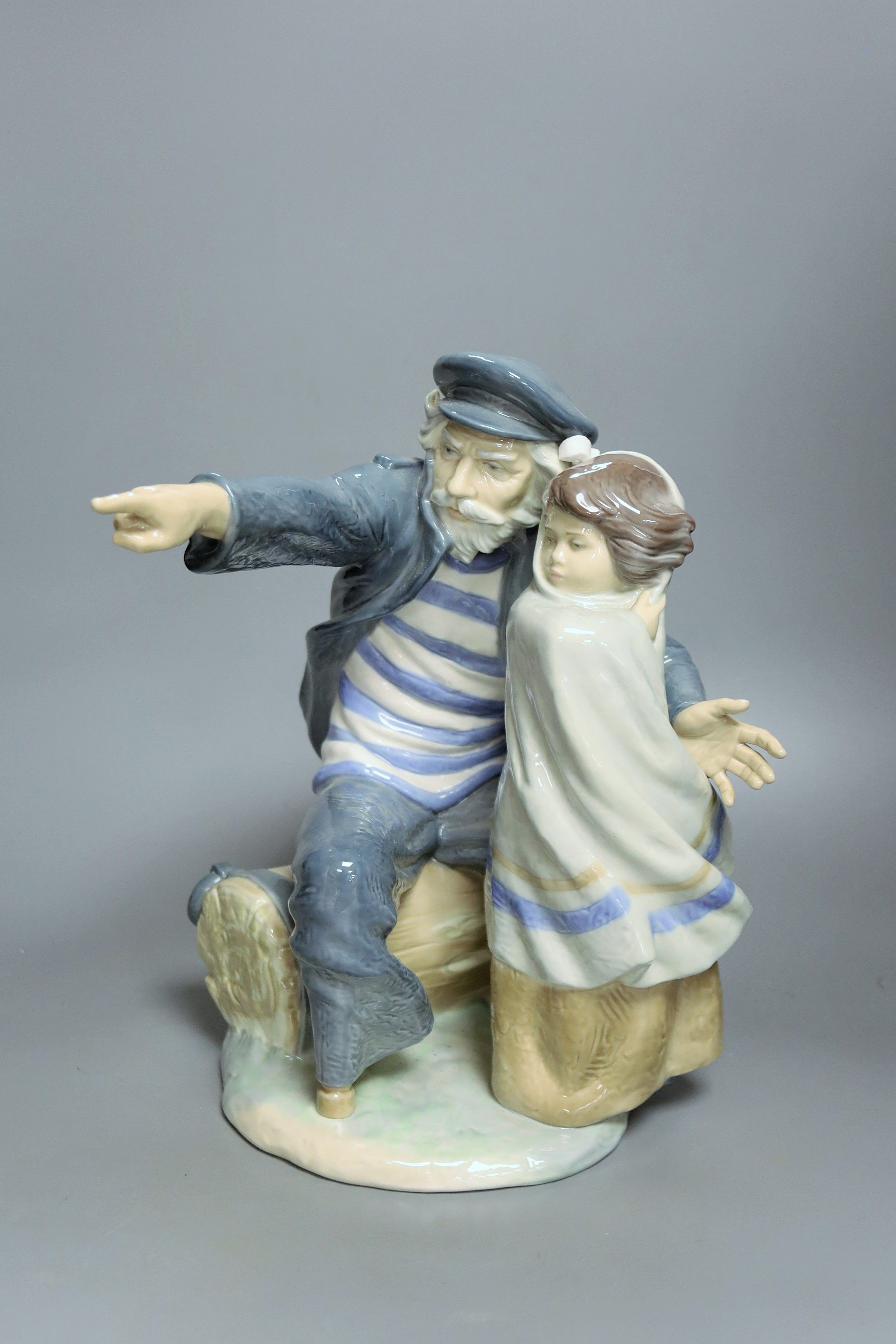 A Nao figure group of a sailor and a boy, height 30cm